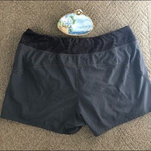 Grey REI women’s XL running shorts.